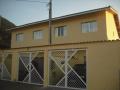 Sobrado novo com 02 dorms 02 vagas garagem - Praia Grande-SP