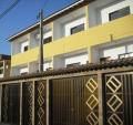 Sobrado novo com 03 suites 03 vagas garagem no subsolo - Praia Grande-SP