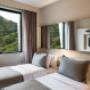 Deluxe Twin Beds Guest Room
