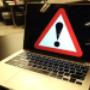 MacBook Advertência