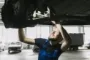 auto-mechanic-looking-car-s-hob_797359_thumb